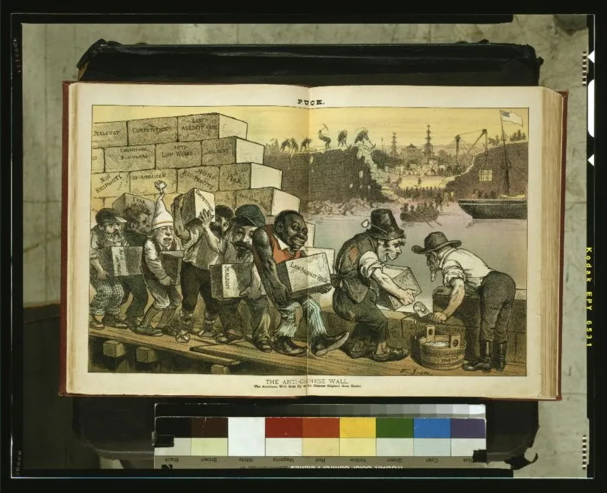 A Puck cartoon shows a multiracial line of American labourers building a wall from blocks labelled prejudice, fear, and laws against race; across the water, Chinese workers dismantle another wall for an arriving American ship.